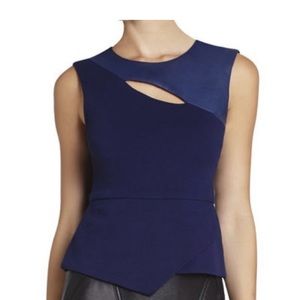 BCBG MaxAzria navy cutout vegan leather peplum top